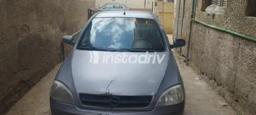 اوبل كورسا 2005 أبيض مستعملة للبيع - 1