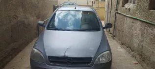 اوبل كورسا 2005 أبيض مستعملة للبيع