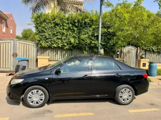 تويوتا كورولا 2009 أسود مستعملة للبيع