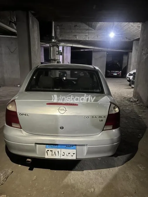 اوبل كورسا 2004 فضي مستعملة للبيع - 1