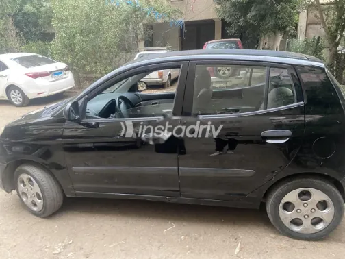 كيا بيكانتو 2008 أسود مستعملة للبيع - 7