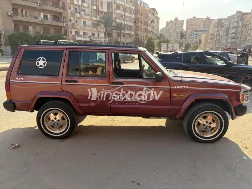 جيب شيروكي 1997 أحمر غامق مستعملة للبيع - 3