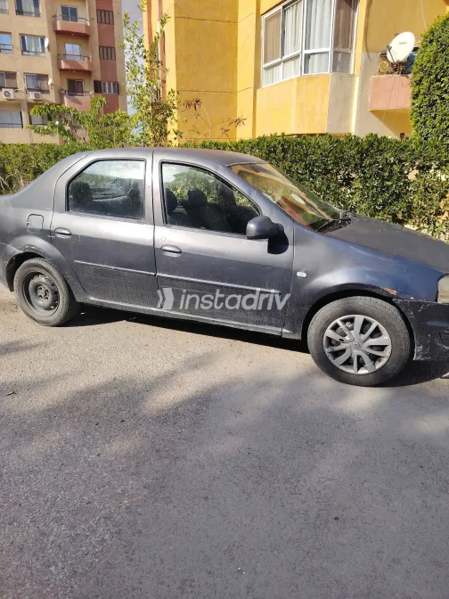 رينو لوجان 2010 أبيض مستعملة للبيع - 1