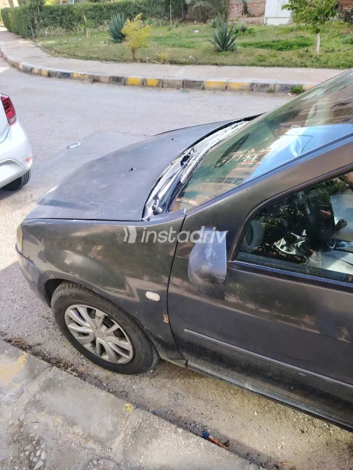 رينو لوجان 2010 أبيض مستعملة للبيع - 2