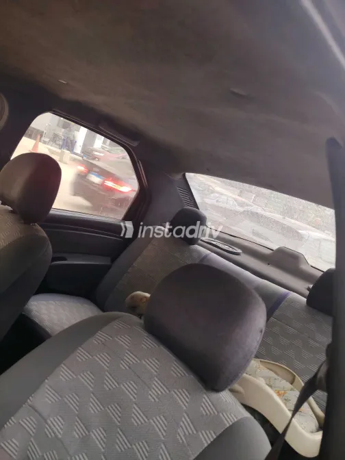 رينو لوجان 2010 أبيض مستعملة للبيع - 9