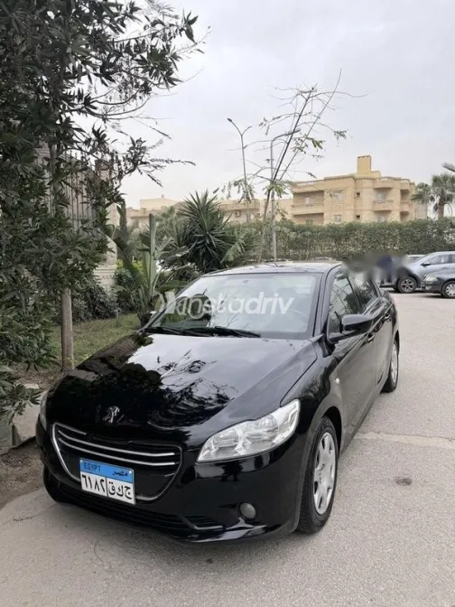 بيجو 301 2016 أسود مستعملة للبيع - 1