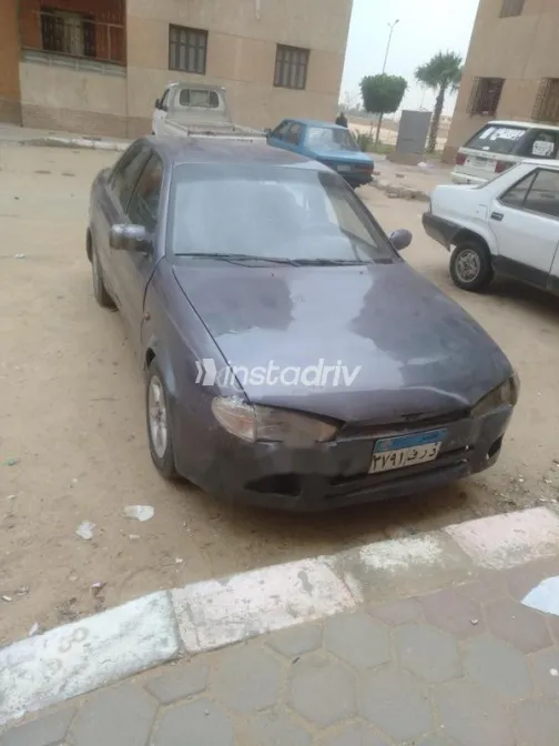 هيونداي إلنترا 1994 رمادي غامق مستعملة للبيع - 1