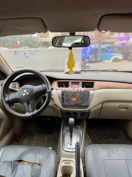 ميتسوبيشي لانسر بومة 2007 أبيض مستعملة للبيع - 1