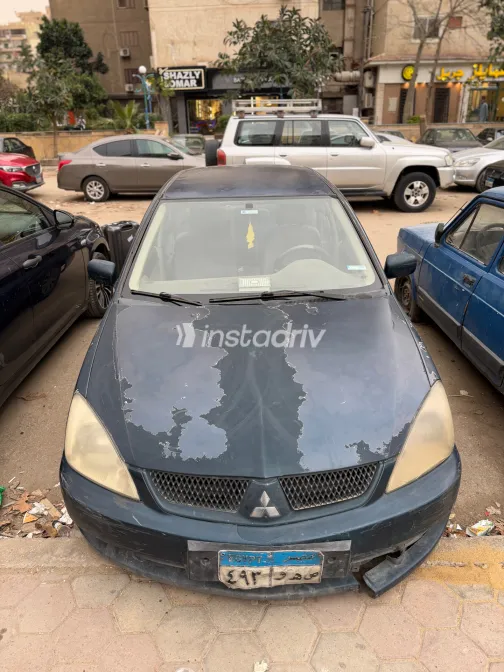 ميتسوبيشي لانسر بومة 2007 أبيض مستعملة للبيع - 3