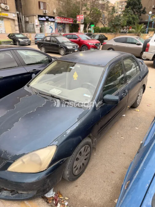 ميتسوبيشي لانسر بومة 2007 أبيض مستعملة للبيع - 4