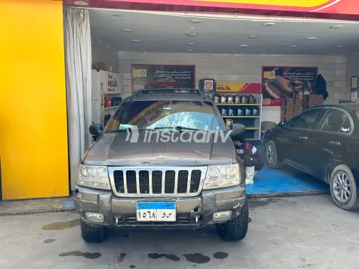 جيب جراند شيروكي 2000 أبيض مستعملة للبيع - 3