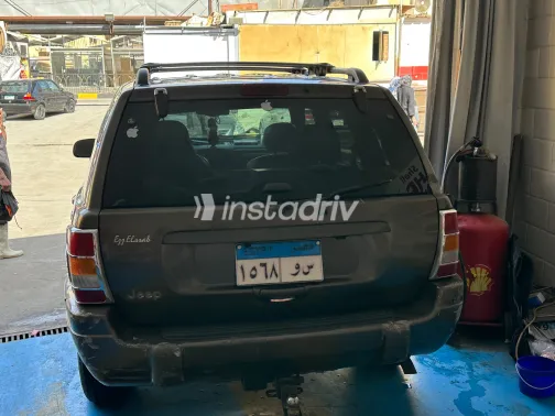 جيب جراند شيروكي 2000 أبيض مستعملة للبيع - 4