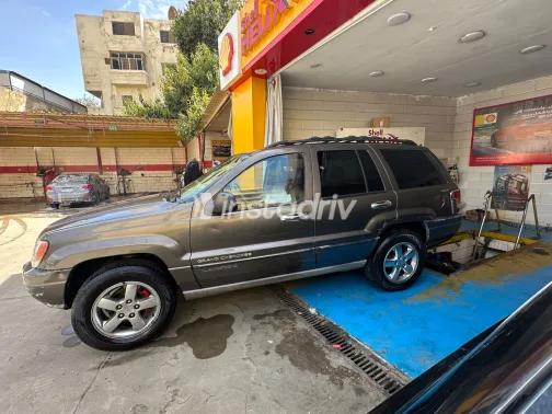 جيب جراند شيروكي 2000 أبيض مستعملة للبيع - 5