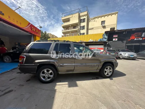 جيب جراند شيروكي 2000 أبيض مستعملة للبيع - 6