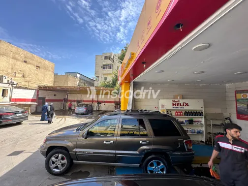 جيب جراند شيروكي 2000 أبيض مستعملة للبيع - 9