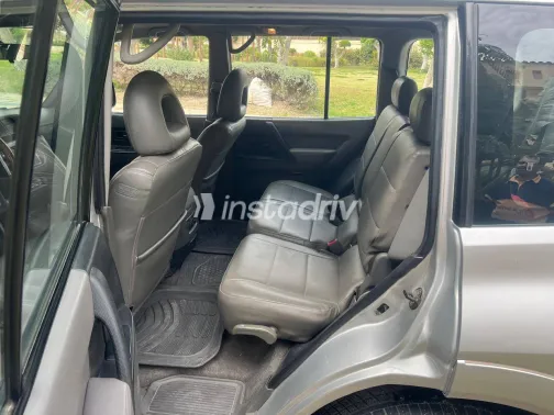 ميتسوبيشي باجيرو 2002 أبيض مستعملة للبيع - 6