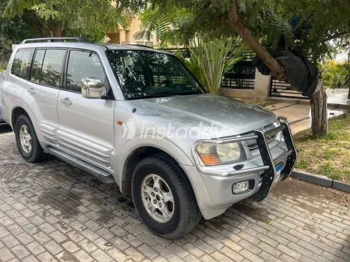 ميتسوبيشي باجيرو 2002 أبيض مستعملة للبيع - 7