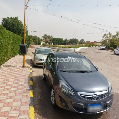 اوبل كورسا 2012 أبيض مستعملة للبيع - 1