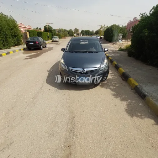 اوبل كورسا 2012 أبيض مستعملة للبيع - 3