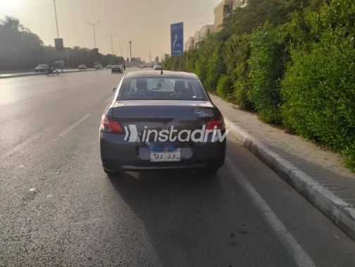 بيجو 301 2012 رمادي غامق مستعملة للبيع - 1