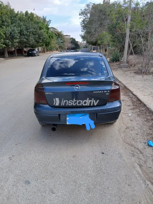 اوبل كورسا 2007 أبيض مستعملة للبيع - 1