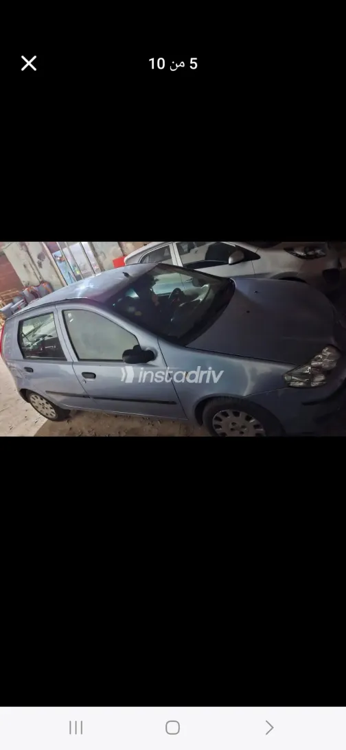 فيات بونتو 2009 أبيض مستعملة للبيع - 9