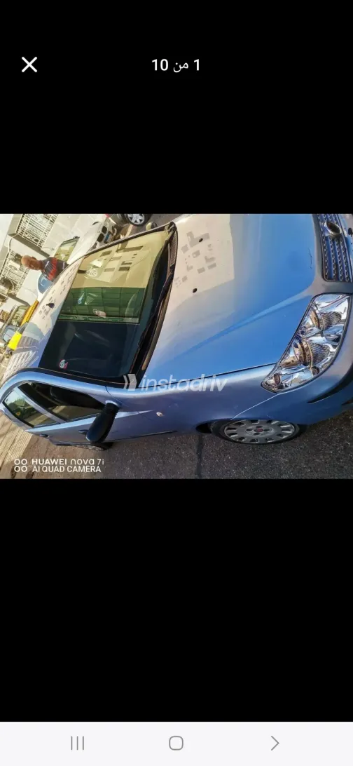 فيات بونتو 2009 أبيض مستعملة للبيع - 10