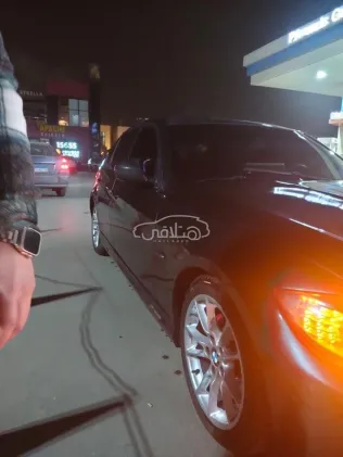 بي ام دبليو 320 2009 رمادي غامق مستعملة للبيع