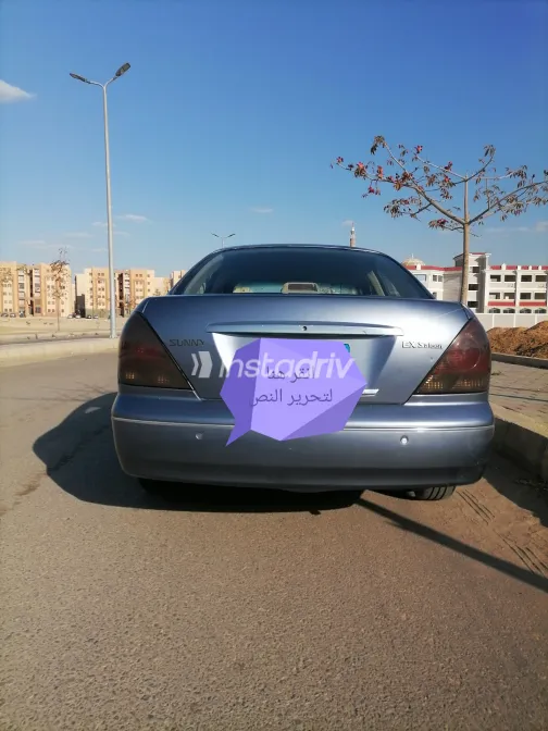 نيسان صنى 2010 أبيض مستعملة للبيع - 2