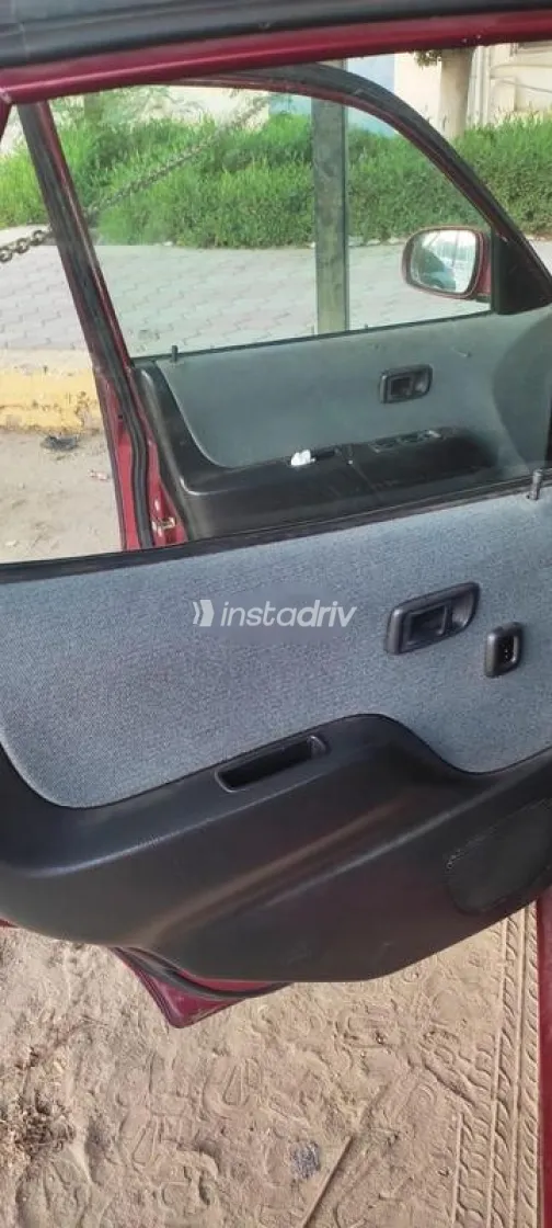 دايهاتسو سيريون 2000 أحمر مستعملة للبيع - 10