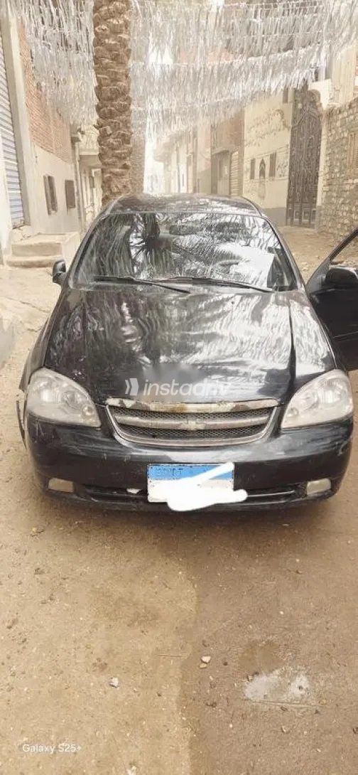 شيفروليه أوبترا 2006 أسود مستعملة للبيع - 1