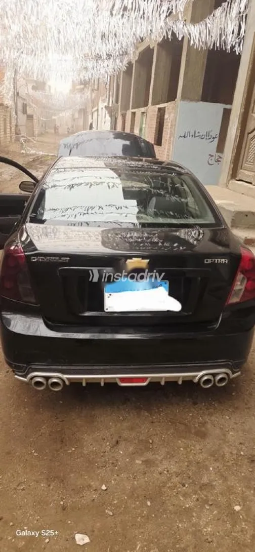شيفروليه أوبترا 2006 أسود مستعملة للبيع - 5