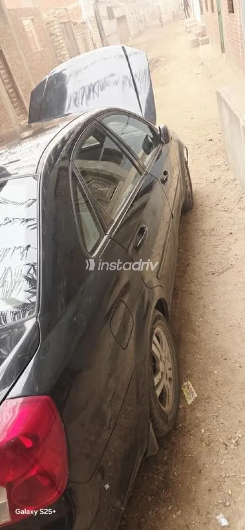 شيفروليه أوبترا 2006 أسود مستعملة للبيع - 7