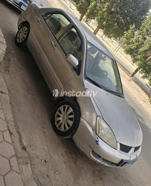 ميتسوبيشي لانسر بومة 2008 شامبين مستعملة للبيع - 1