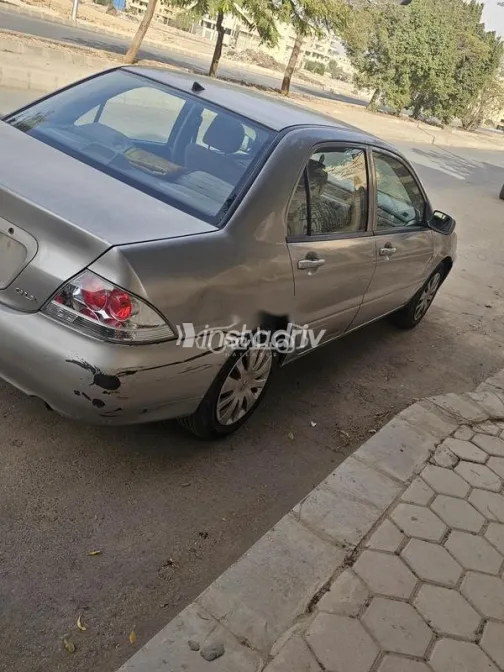 ميتسوبيشي لانسر بومة 2008 شامبين مستعملة للبيع - 2