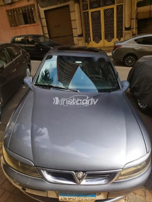 اوبل فيكترا 2001 أبيض مستعملة للبيع - 9