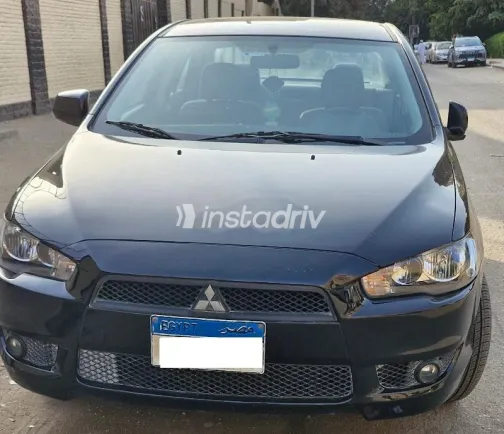 ميتسوبيشي لانسر اى اكس شارك 2016 شامبين مستعملة للبيع - 1