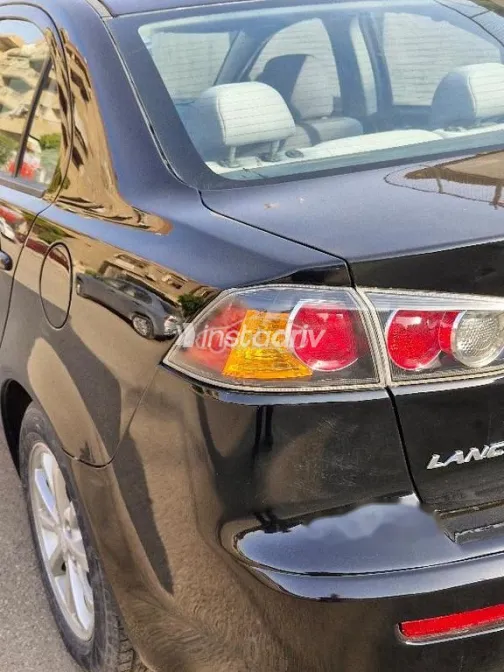 ميتسوبيشي لانسر اى اكس شارك 2016 شامبين مستعملة للبيع - 2