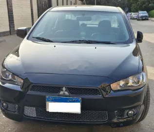 ميتسوبيشي لانسر اى اكس شارك 2016 شامبين مستعملة للبيع