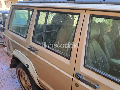 جيب شيروكي 1996 أبيض مستعملة للبيع - 4