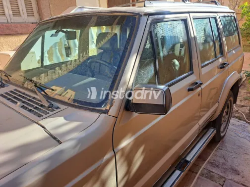 جيب شيروكي 1996 أبيض مستعملة للبيع - 5