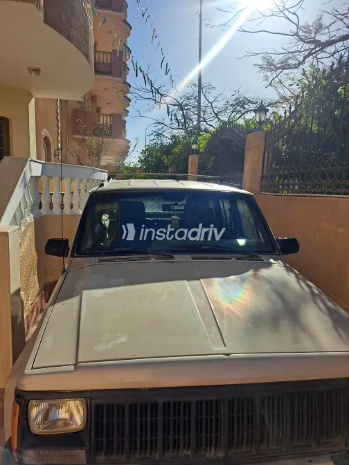 جيب شيروكي 1996 أبيض مستعملة للبيع - 6