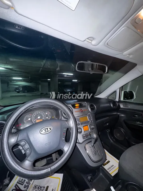 كيا كارينز 2012 أبيض مستعملة للبيع - 2