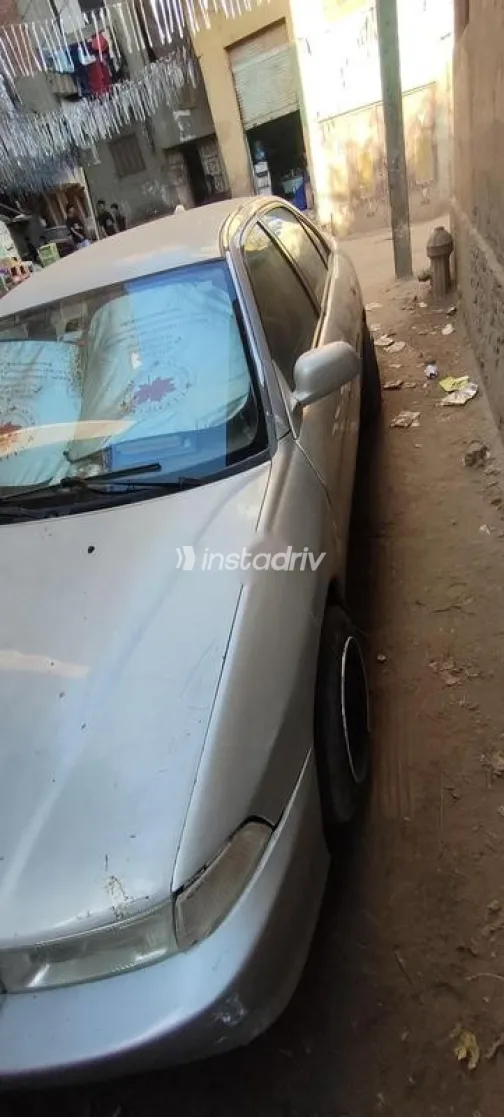 ميتسوبيشي ميراج 2006 فضي مستعملة للبيع - 2