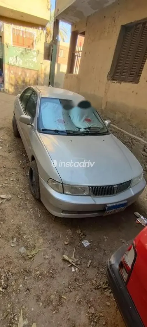 ميتسوبيشي ميراج 2006 فضي مستعملة للبيع - 4