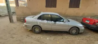 ميتسوبيشي ميراج 2006 فضي مستعملة للبيع