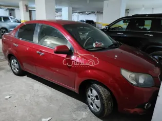 شيفروليه افيو 2016 أحمر غامق مستعملة للبيع