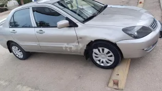 ميتسوبيشي لانسر بومة 2013 شامبين مستعملة للبيع