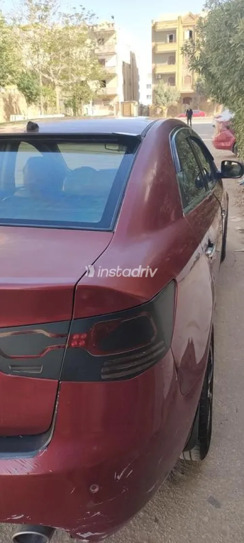 كيا سيراتو 2011 أحمر غامق مستعملة للبيع - 2