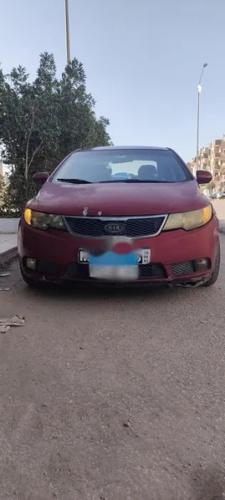 كيا سيراتو 2011 أحمر غامق مستعملة للبيع